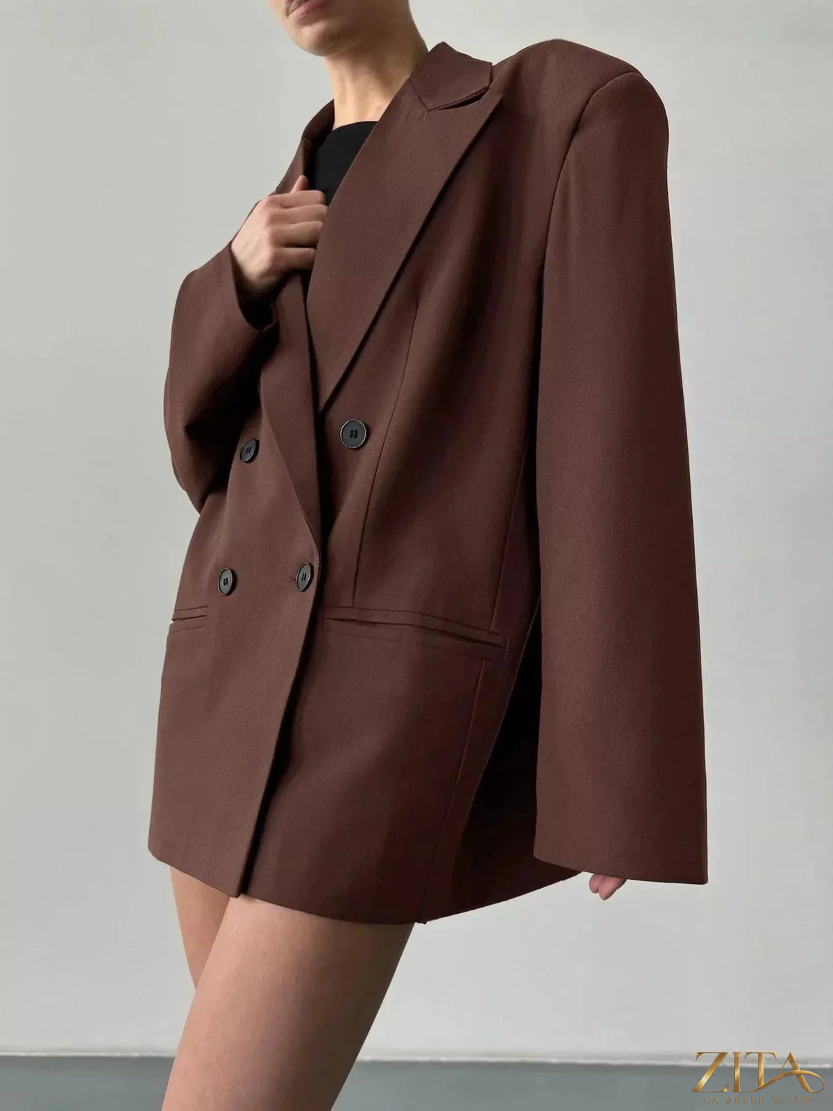 Trendsi double-breasted blazer with lapel collar, tailored fit, in neutral fabric, styled on a hanger.