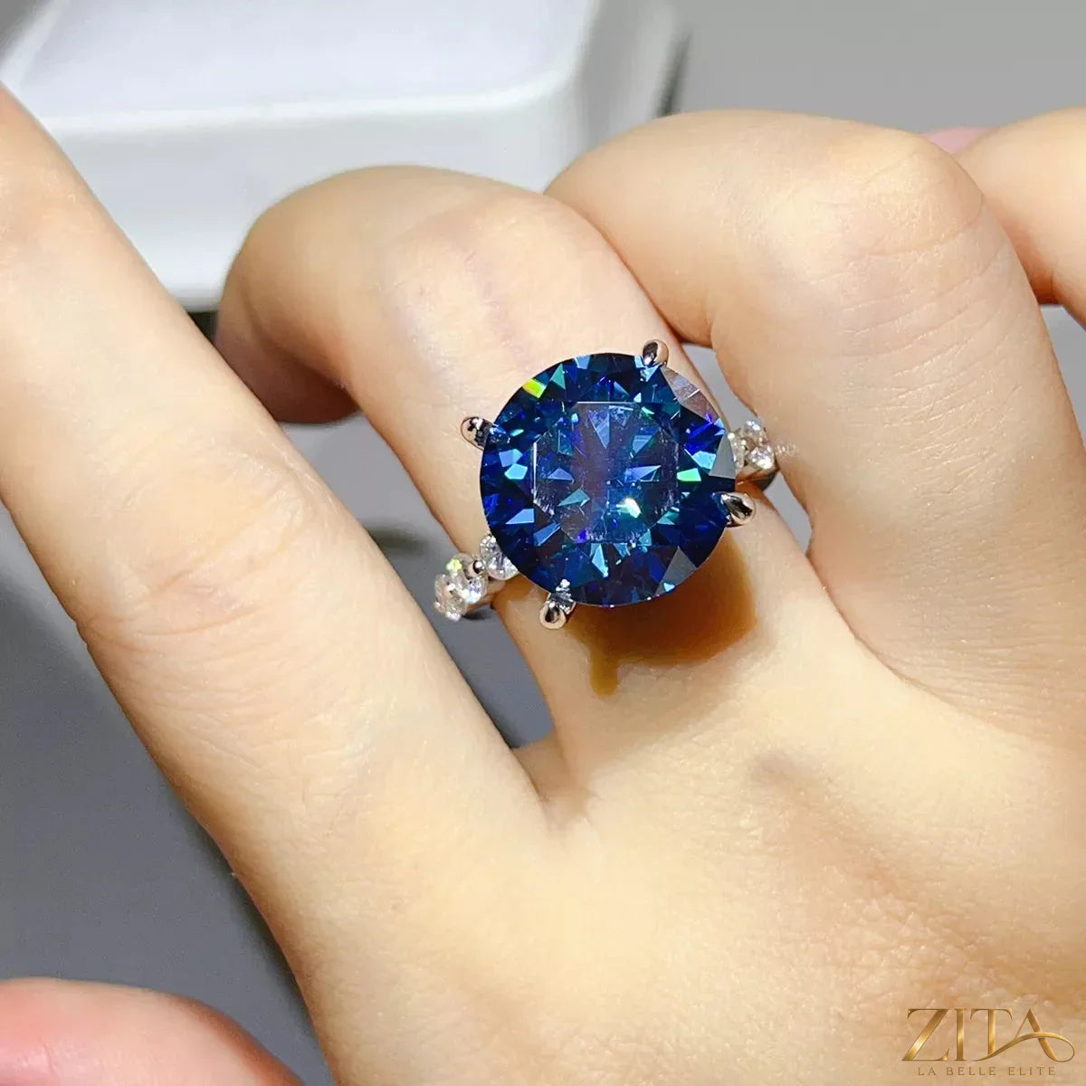 Sterling silver moissanite ring with a 10-carat gemstone, featuring a sleek design and elegant craftsmanship.