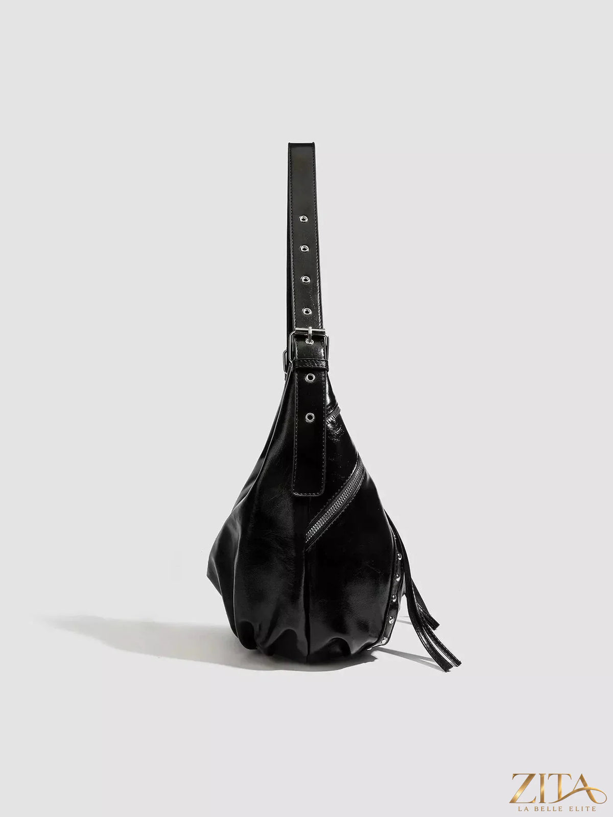 Zita La Belle Elite studded patent leather hobo shoulder bag with gold-tone hardware and spacious interior.