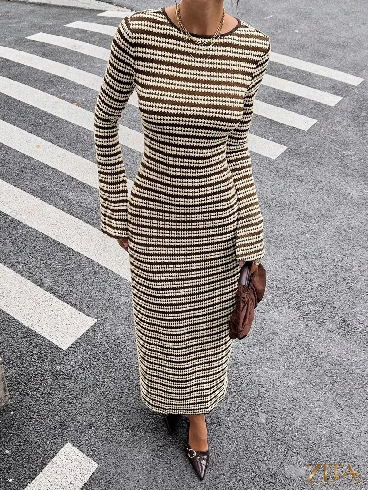 Zita La Belle Elite striped flared sleeves sweater dress with a fitted bodice and vibrant pattern, styled for a fashionable look.