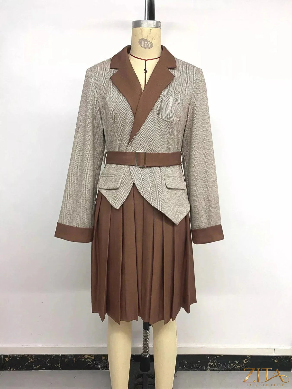 Zita La Belle Elite pleated patchwork blazer belt dress featuring a fitted silhouette and stylish design fabric.