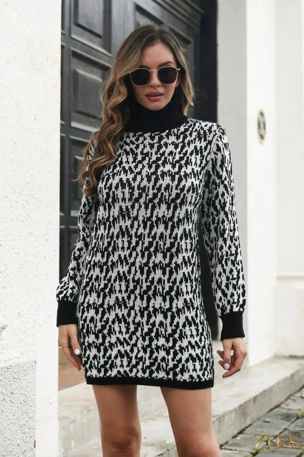 Heathered turtleneck mini sweater dress by Trendsi, featuring a cozy fit and ribbed detailing, perfect for stylish cold-weather wear.
