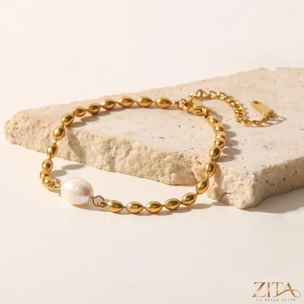 Pearl and gold chain jewelry set with matching necklace and bracelet, elegant accessories by Trendsi.