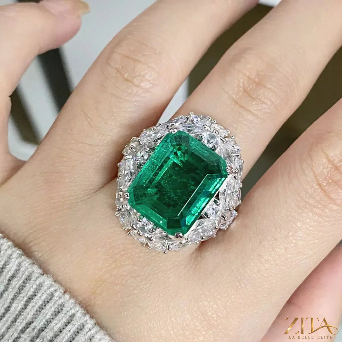 Sterling silver zircon ring with intricate design, showcasing sparkling stones on a sleek band.