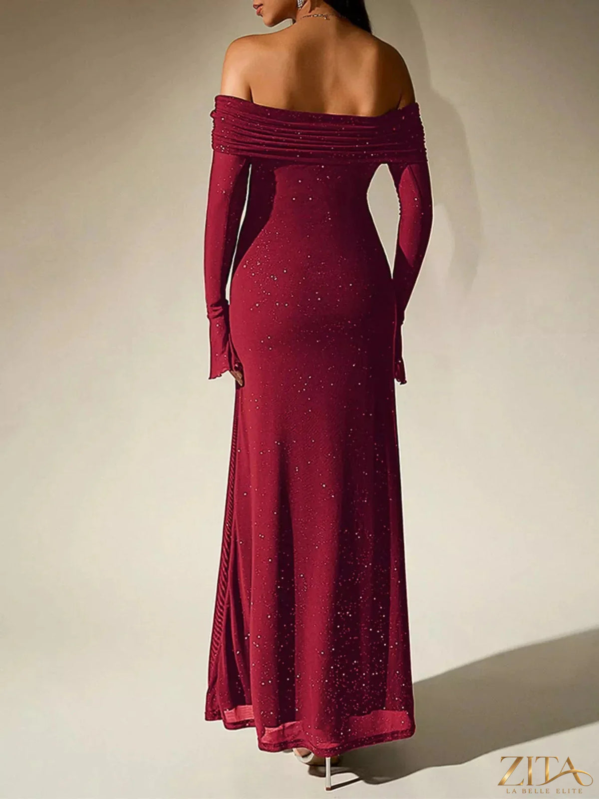 Zita La Belle Elite glitter off-shoulder maxi dress with flowing fabric and elegant design, perfect for formal occasions.