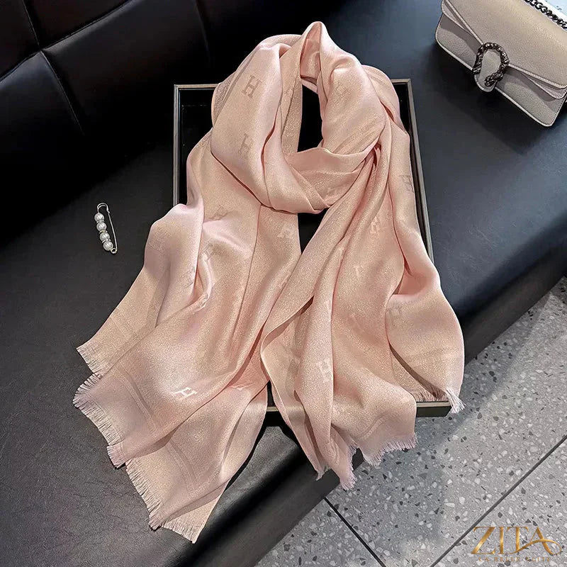 Raw hem scarf from Trendsi featuring soft, lightweight fabric with a casual, fringed edge, perfect for stylish layering.