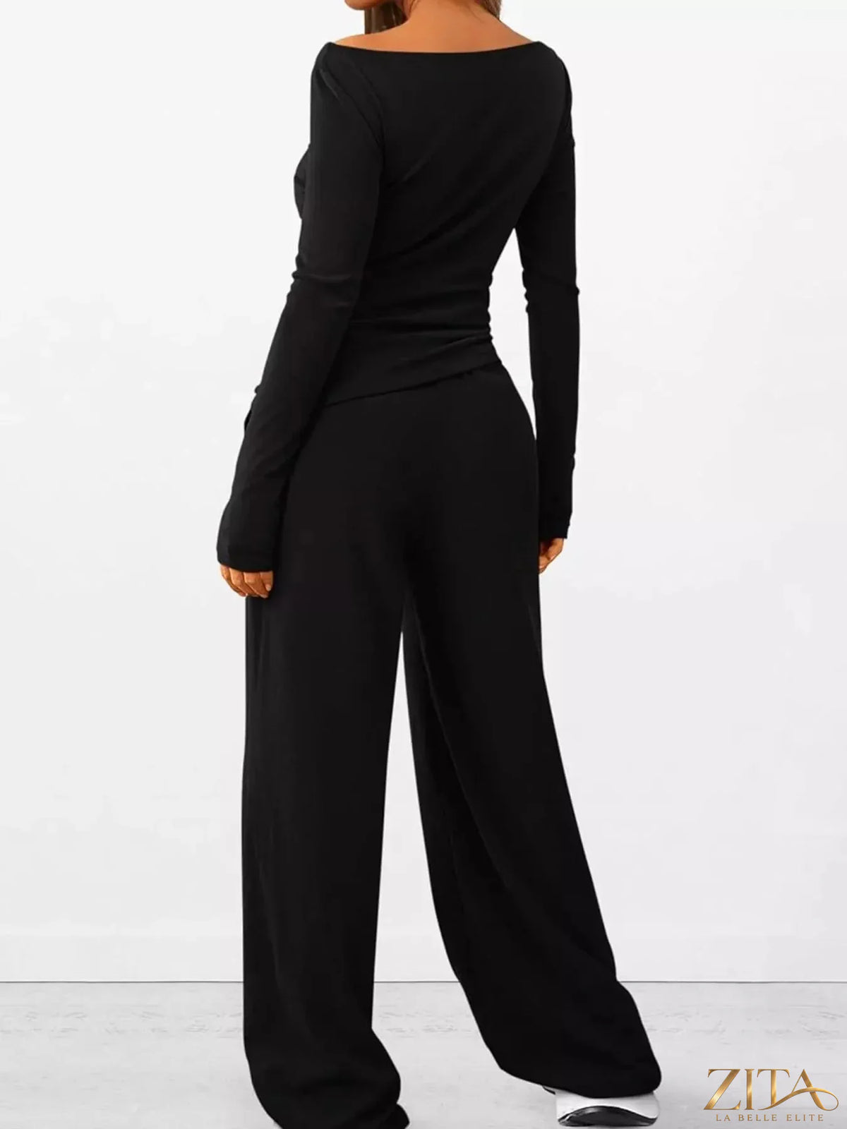 Zita La Belle Elite long sleeve top and wide leg pants set in soft fabric, displayed on a hanger against a neutral background.