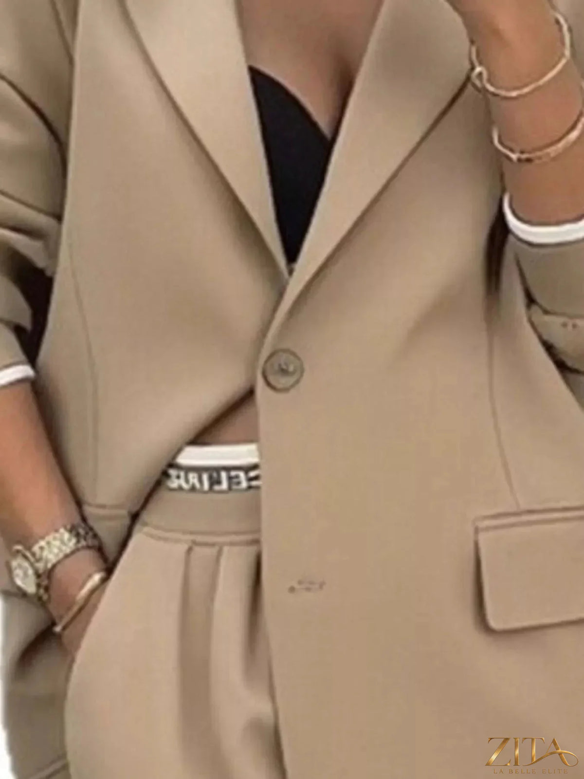 Plus size Zita La Belle Elite blazer and wide-leg pants set featuring a single-button blazer and matching high-waisted pants.