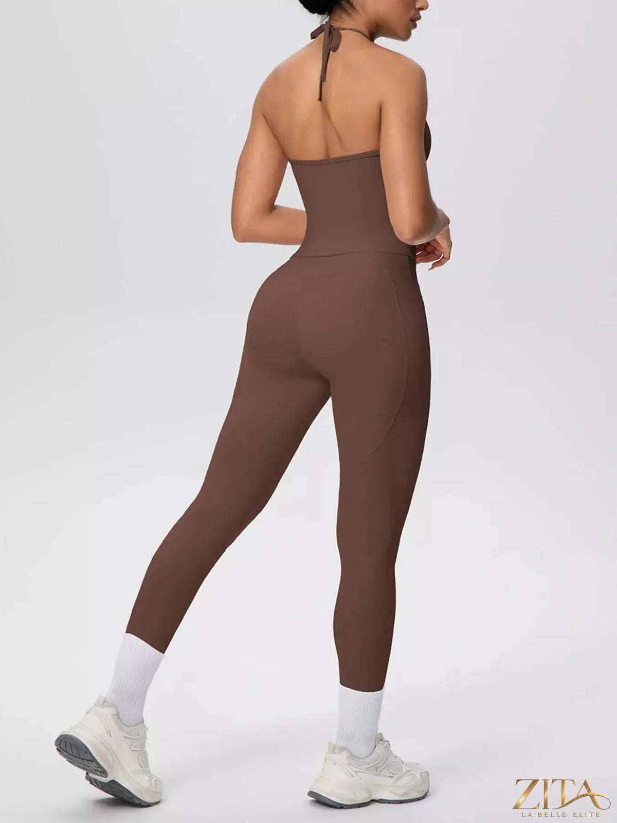 Zita La Belle Elite halter neck cami and high-waisted leggings active set, black fabric, close-up view of the stylish workout outfit.
