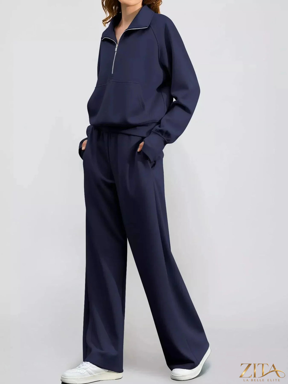 Zita La Belle Elite half-zip sweatshirt and wide-leg pants set in soft fabric, shown on a model with neutral background.