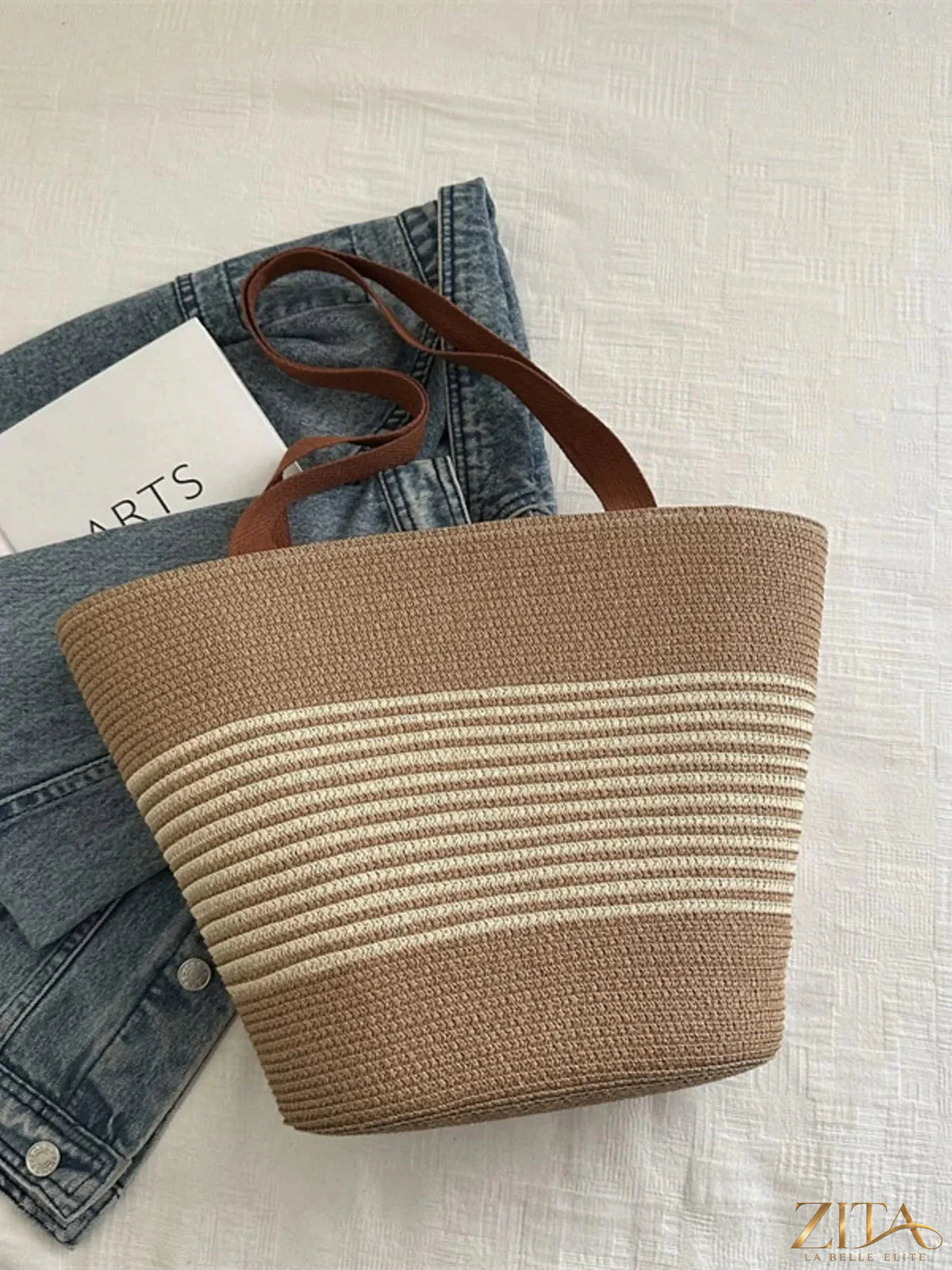 Striped woven tote bag by Zita La Belle Elite with sturdy handles and spacious interior, perfect for carrying daily essentials.
