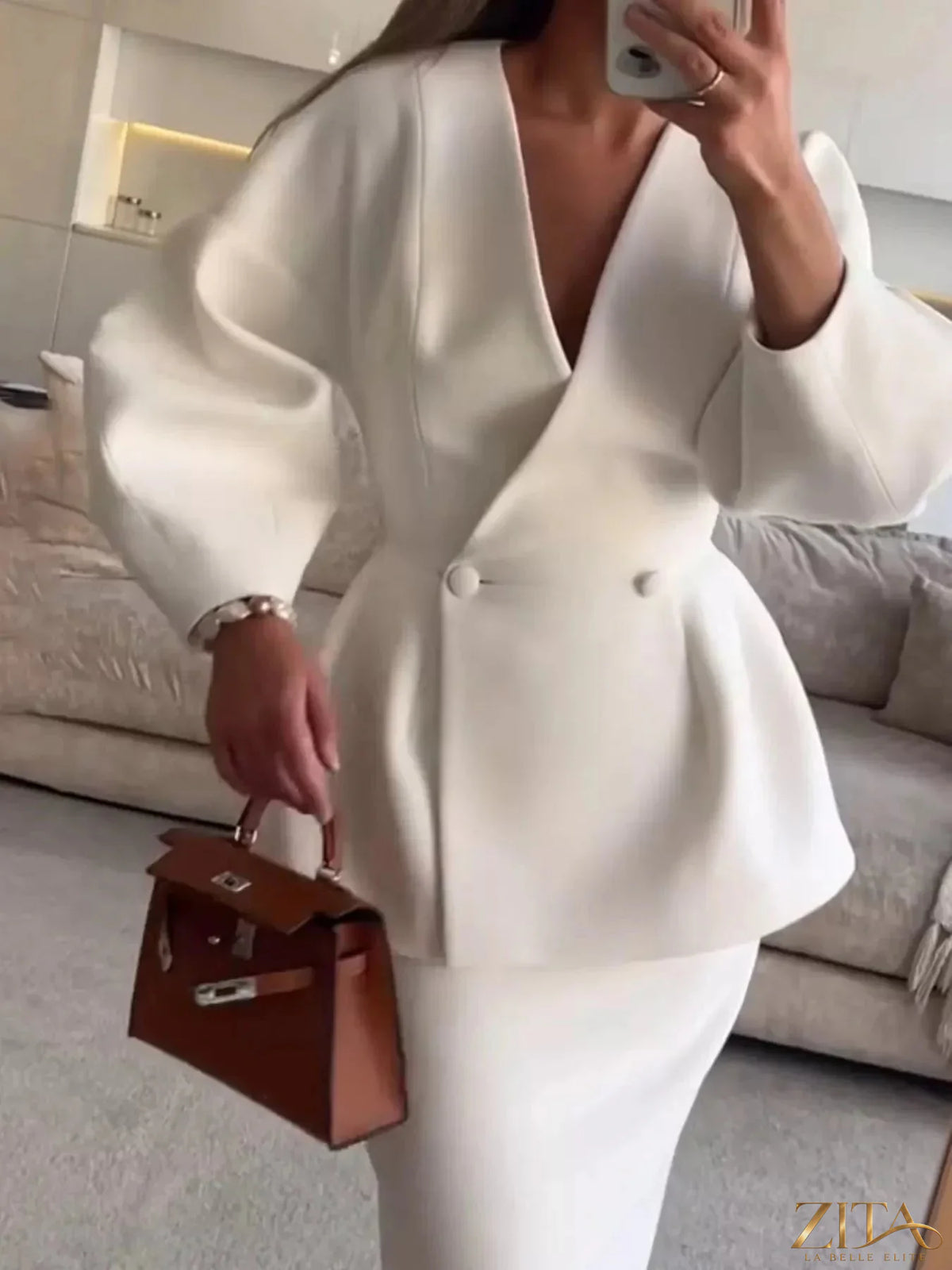 Zita La Belle Elite double-breasted peplum blazer and matching skirt set, tailored fit, in a stylish professional look.