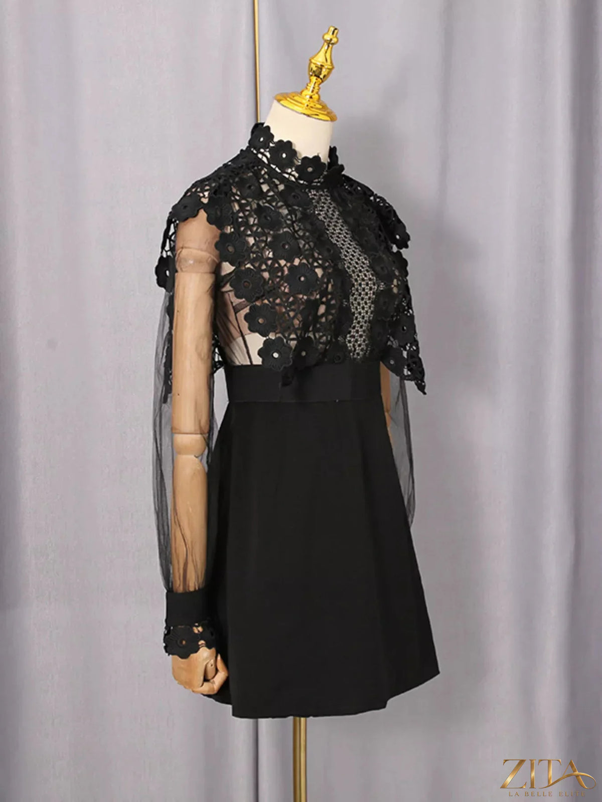 Lace sheer sleeve mini dress by Trendsi featuring a fitted silhouette, delicate lace details, and a stylish short length.