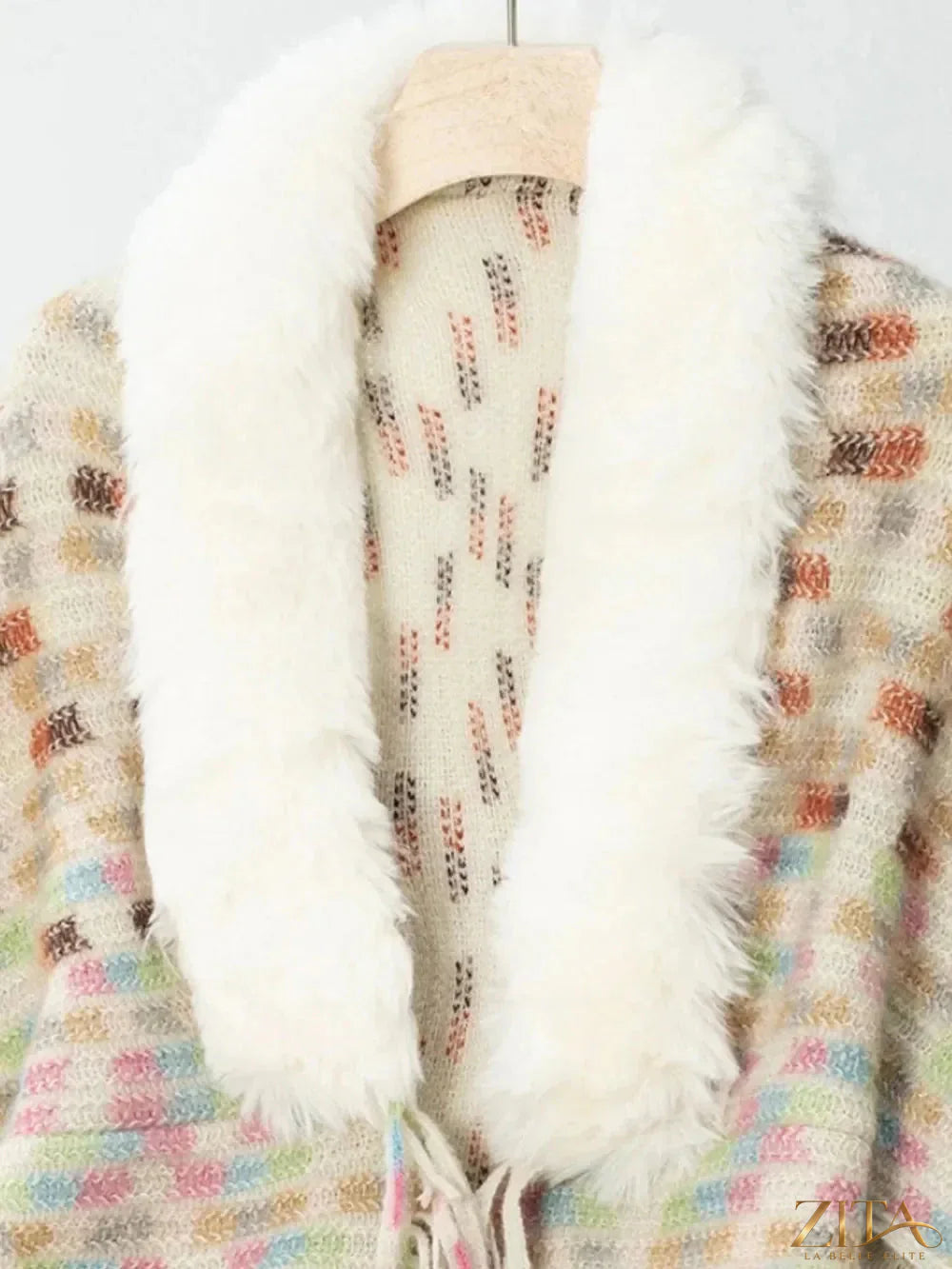Fuzzy open front fringed poncho in neutral tones, stylish and cozy, by Trendsi with fringe detailing along the edges.