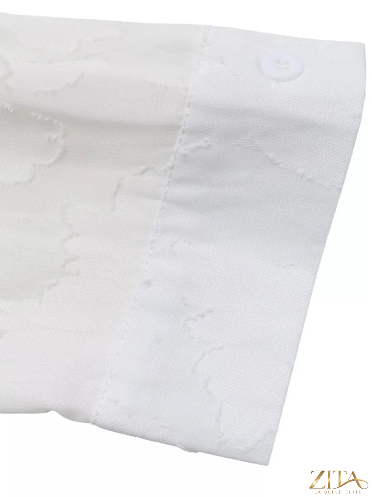 Sheer button-down shirt from Zita La Belle Elite, lightweight and transparent fabric, shown on a model.