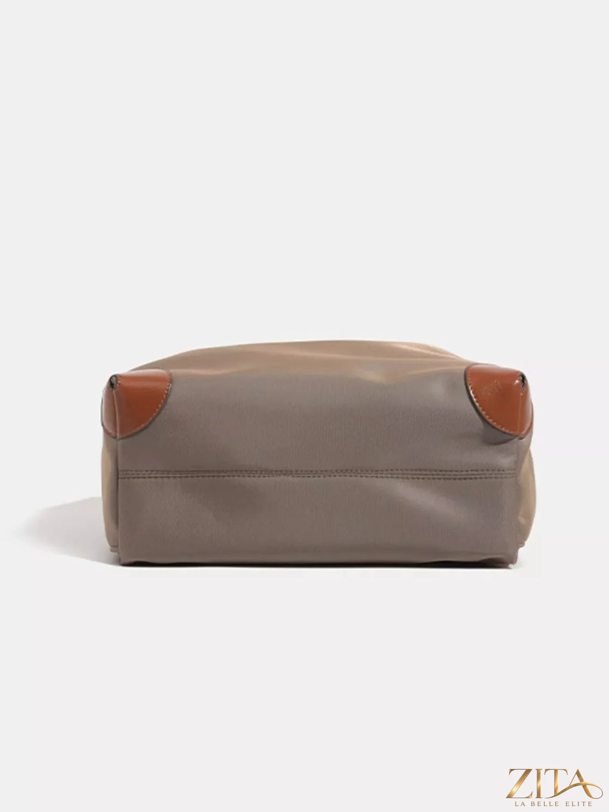 Leather trim backpack bag with adjustable straps and multiple compartments, featuring stylish leather accents from Trendsi.