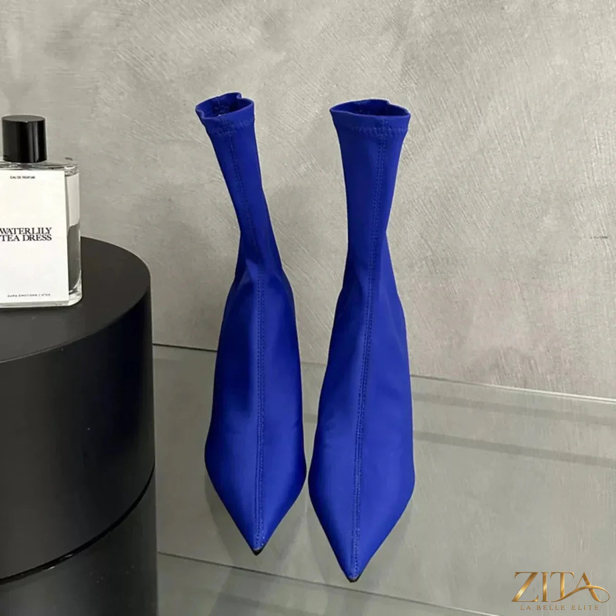 Zita La Belle Elite point toe mid heel boots in black leather, showcasing sleek design and elegant silhouette