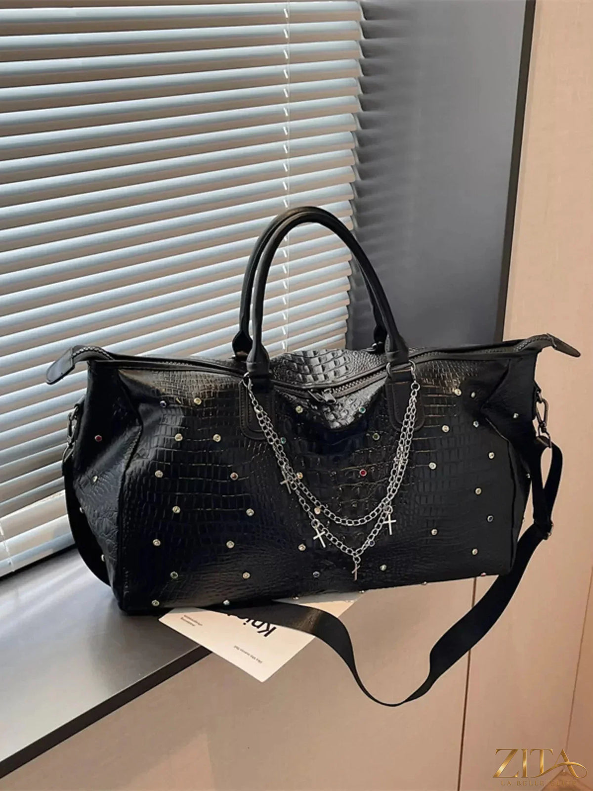 Large capacity Zita La Belle Elite studded travel bag with sturdy handles and multiple compartments for stylish travel organization.