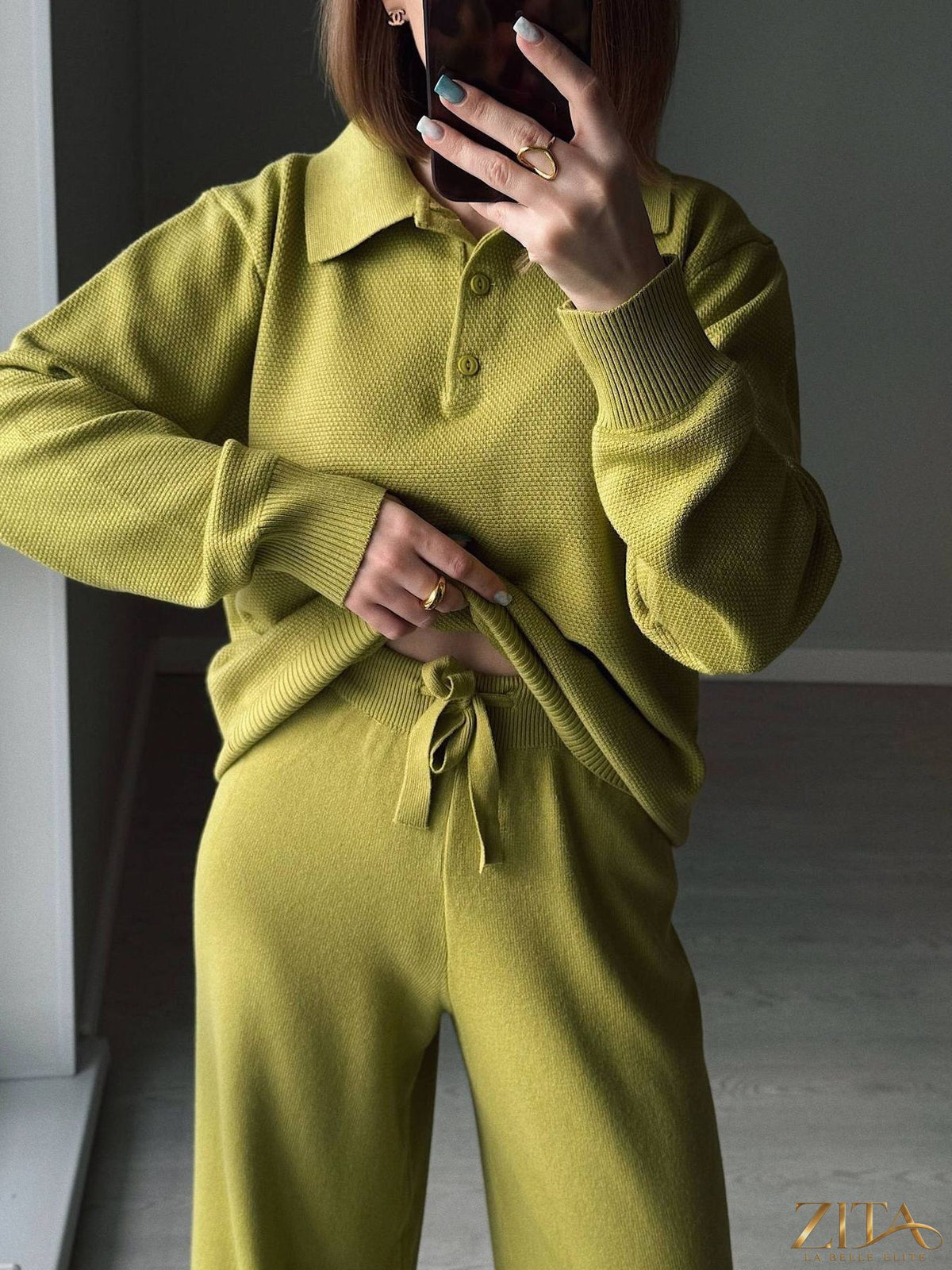 Zita La Belle Elite knit set featuring a polo collar top with matching pants or skirt, in a stylish and comfortable design.