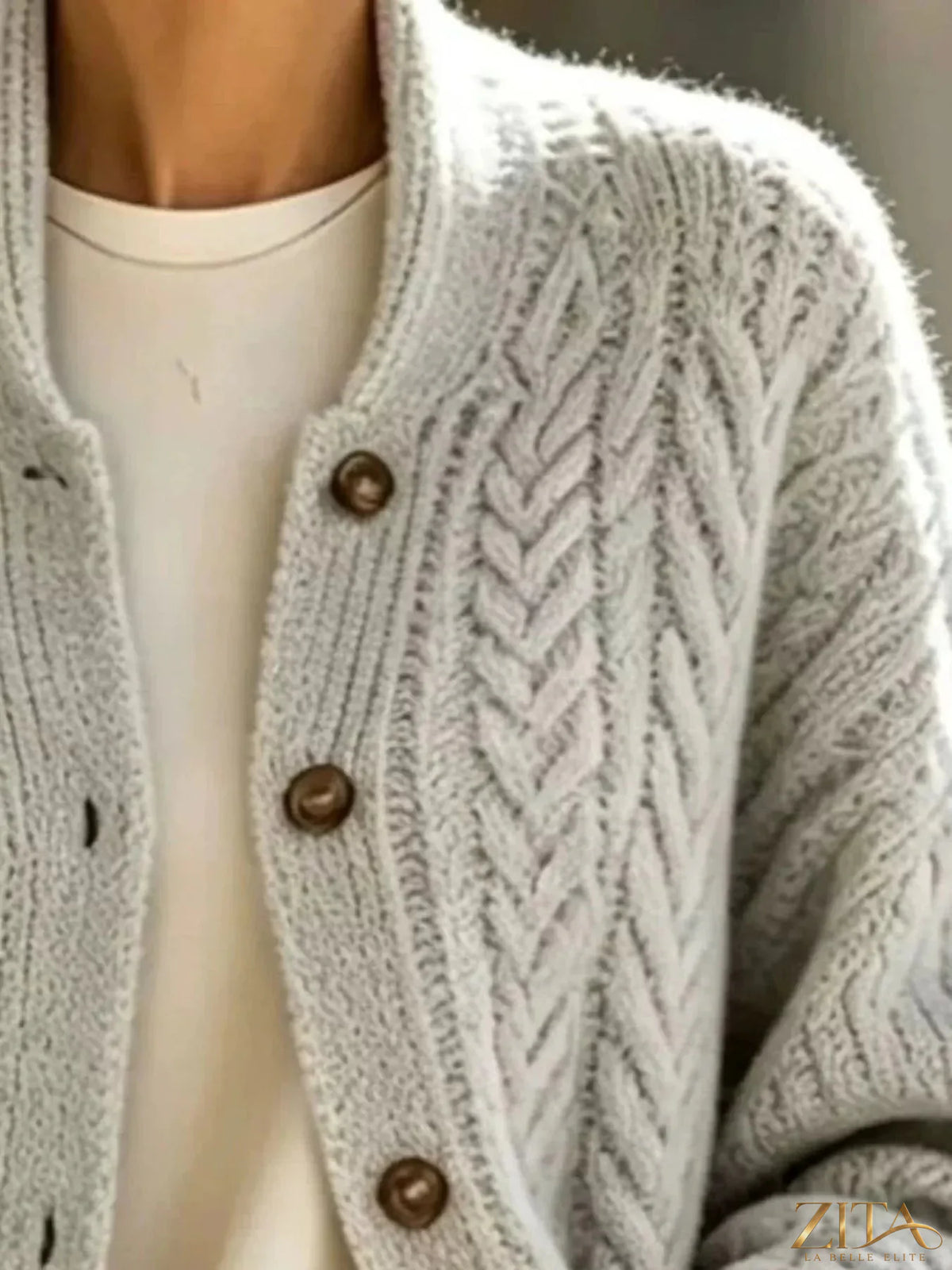 Plus size Zita La Belle Elite cable-knit button-down cardigan, full size, featuring a cozy, textured knit pattern and classic design.