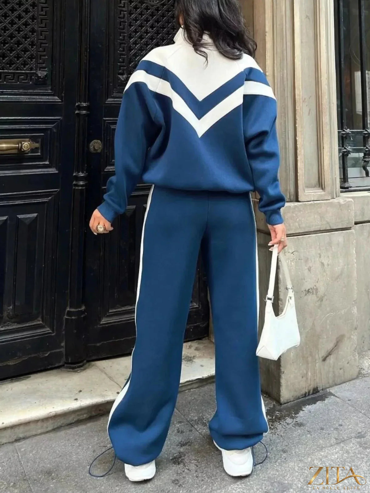 Zita La Belle Elite color block zip-up outerwear and pants set with vibrant contrasting panels and a sporty fit.