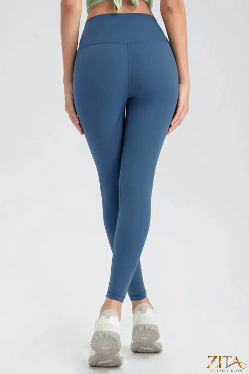 Trendsi wide waistband slim fit active leggings shown in black with a high-rise design and stretchy fabric for workout comfort.