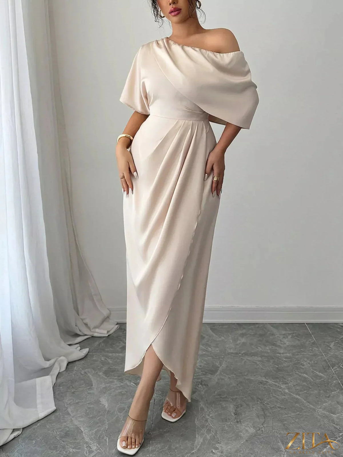 Elegant one-shoulder satin maxi dress by Trendsi, flowing fabric with a stylish drape and a sleek silhouette.