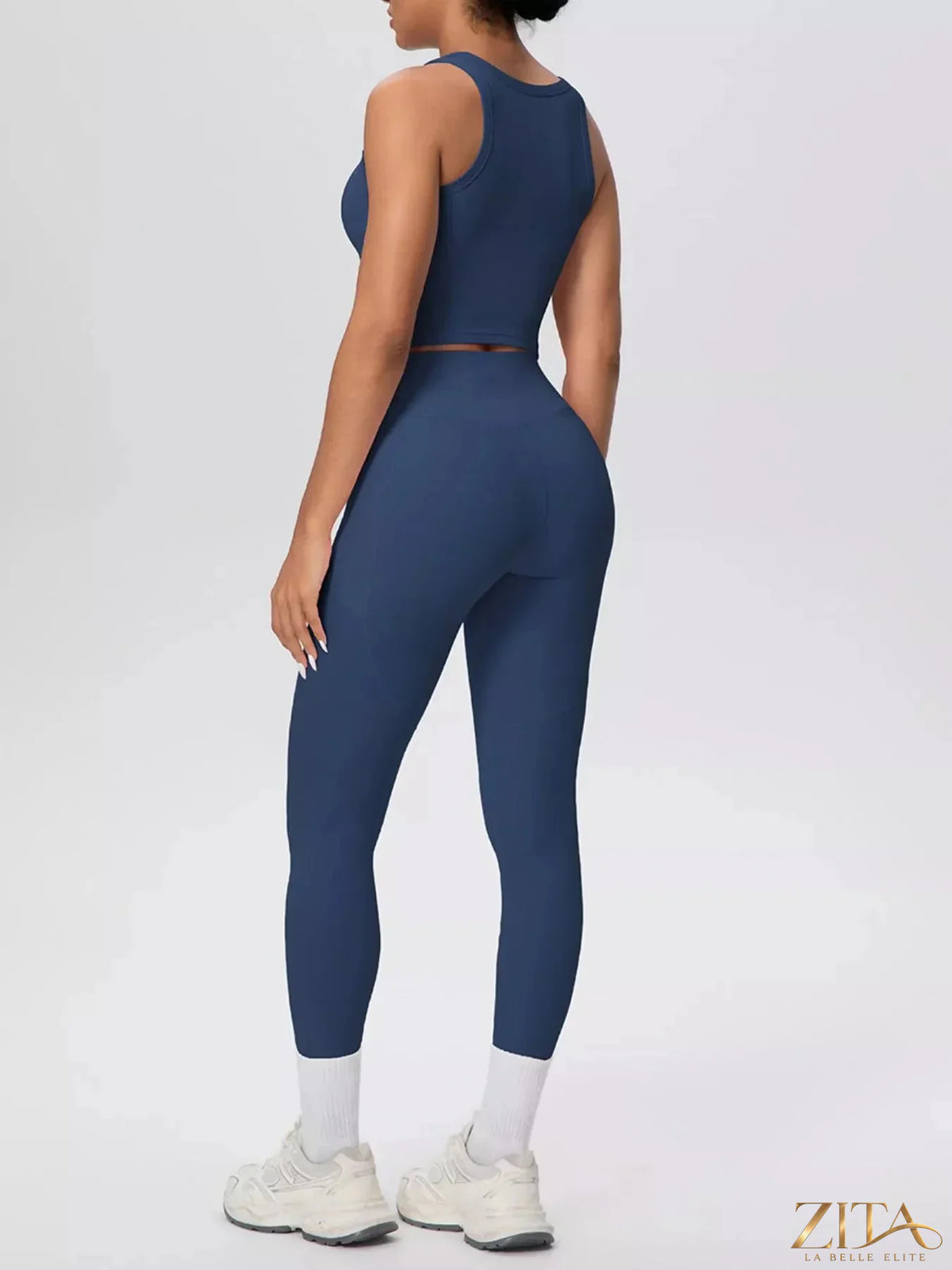 Zita La Belle Elite scoop neck tank top and high-waisted leggings active set, shown in black on a model.