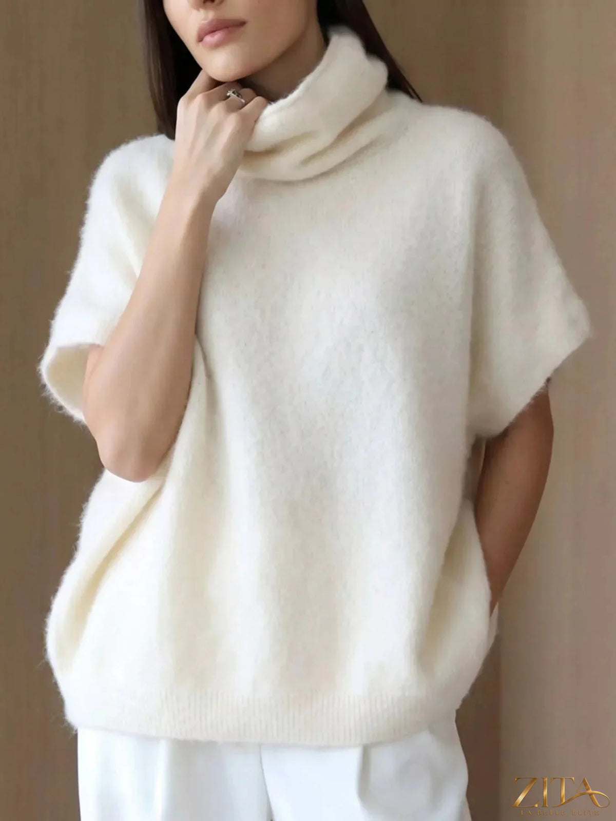 Zita La Belle Elite fuzzy short sleeve turtleneck sweater in soft, warm fabric, displayed on a neutral background.