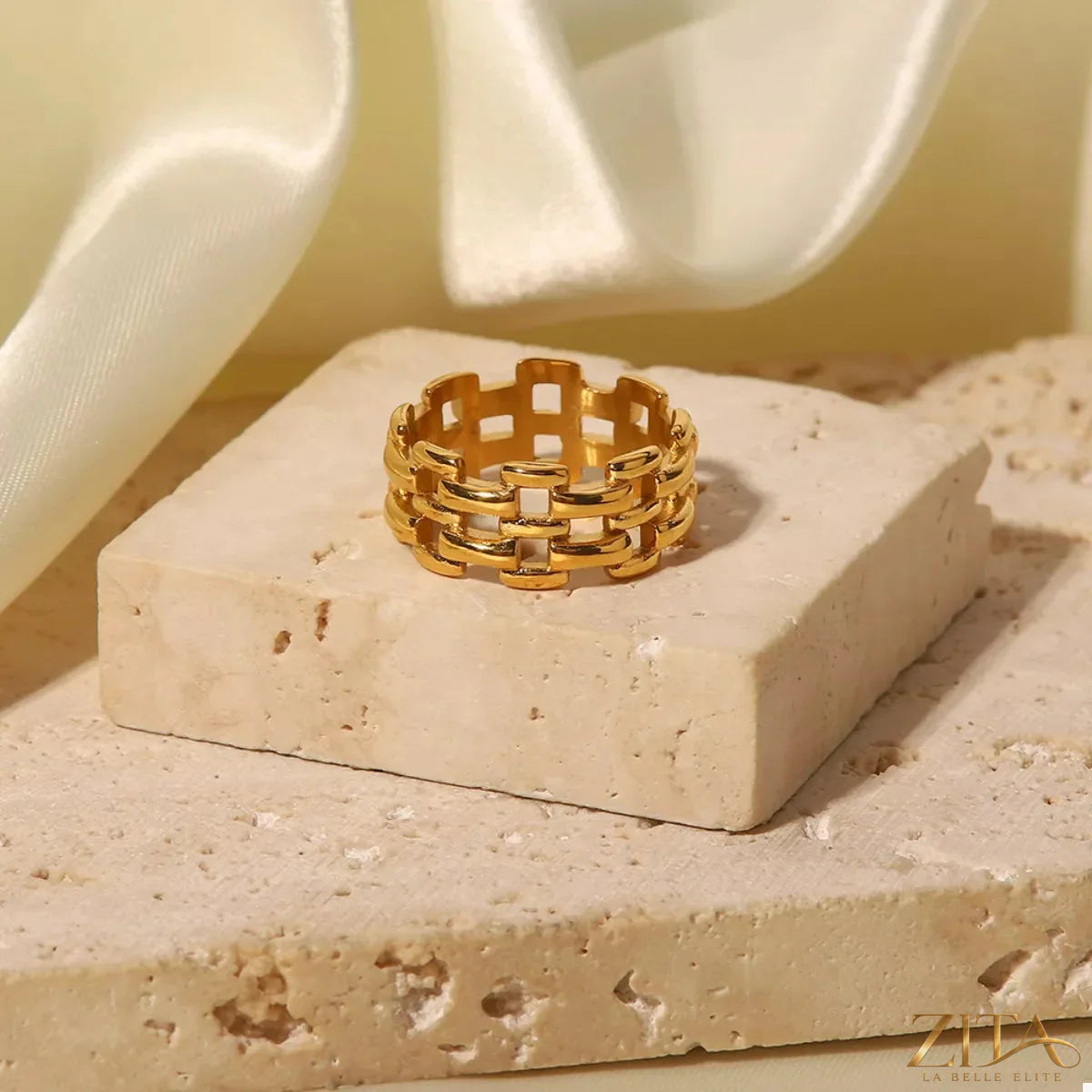 18K gold-plated cutout ring by Zita La Belle Elite featuring intricate openwork design and a shiny gold finish.