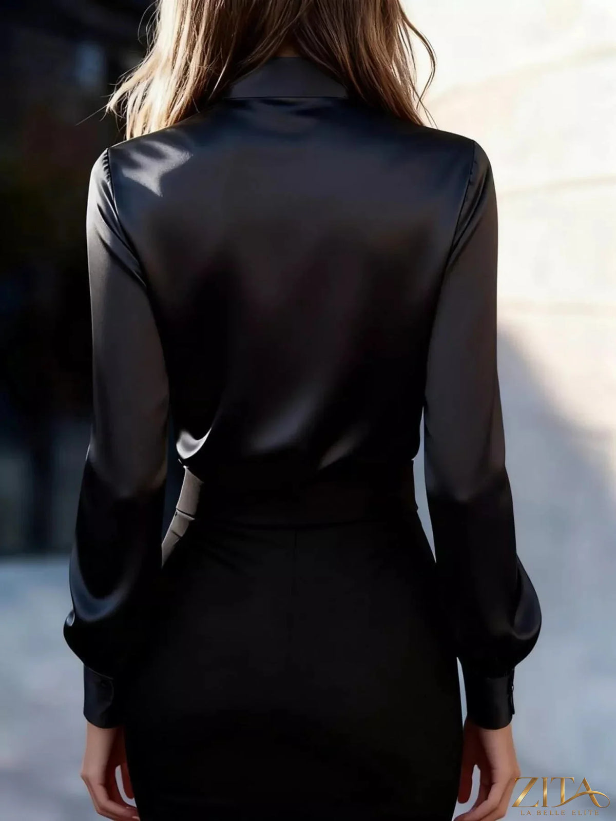 Zita La Belle Elite satin bow tie long sleeve blouse featuring a stylish bow detail and elegant long sleeves.