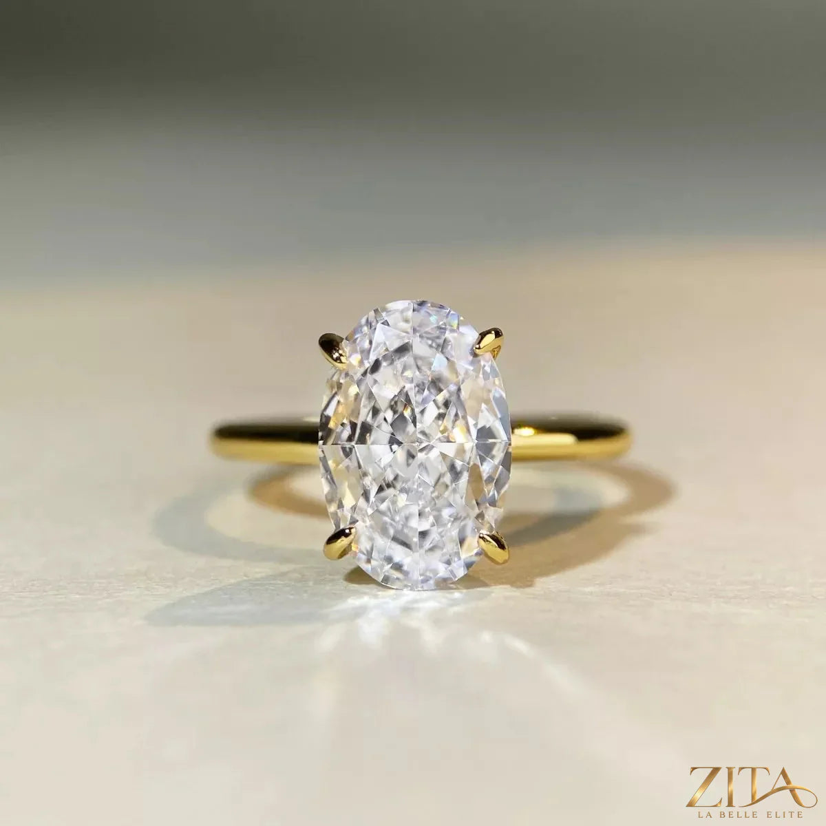 18K gold-plated zircon ring by Zita La Belle Elite, featuring sparkling zircon stones and a sleek band design.