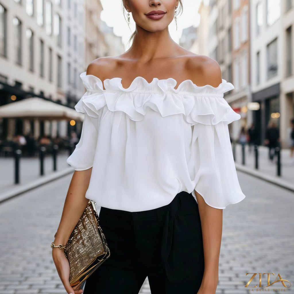 Women's loose-fit minimalist short-sleeve casual shirt by Zita La Belle Elite, shown on a white background.