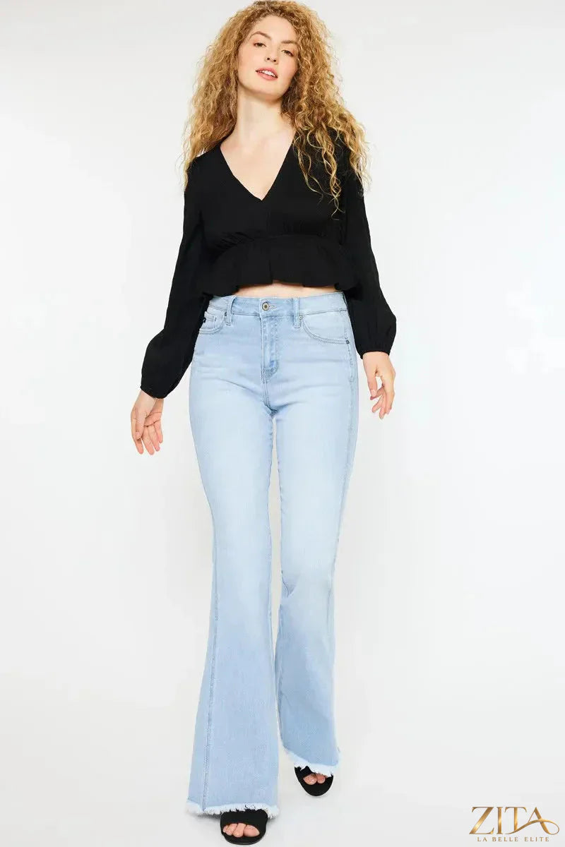 Zita La Belle Elite Kancan high rise curvy flare jeans displayed on a model, showcasing the fit and style of these trendy denim jeans.