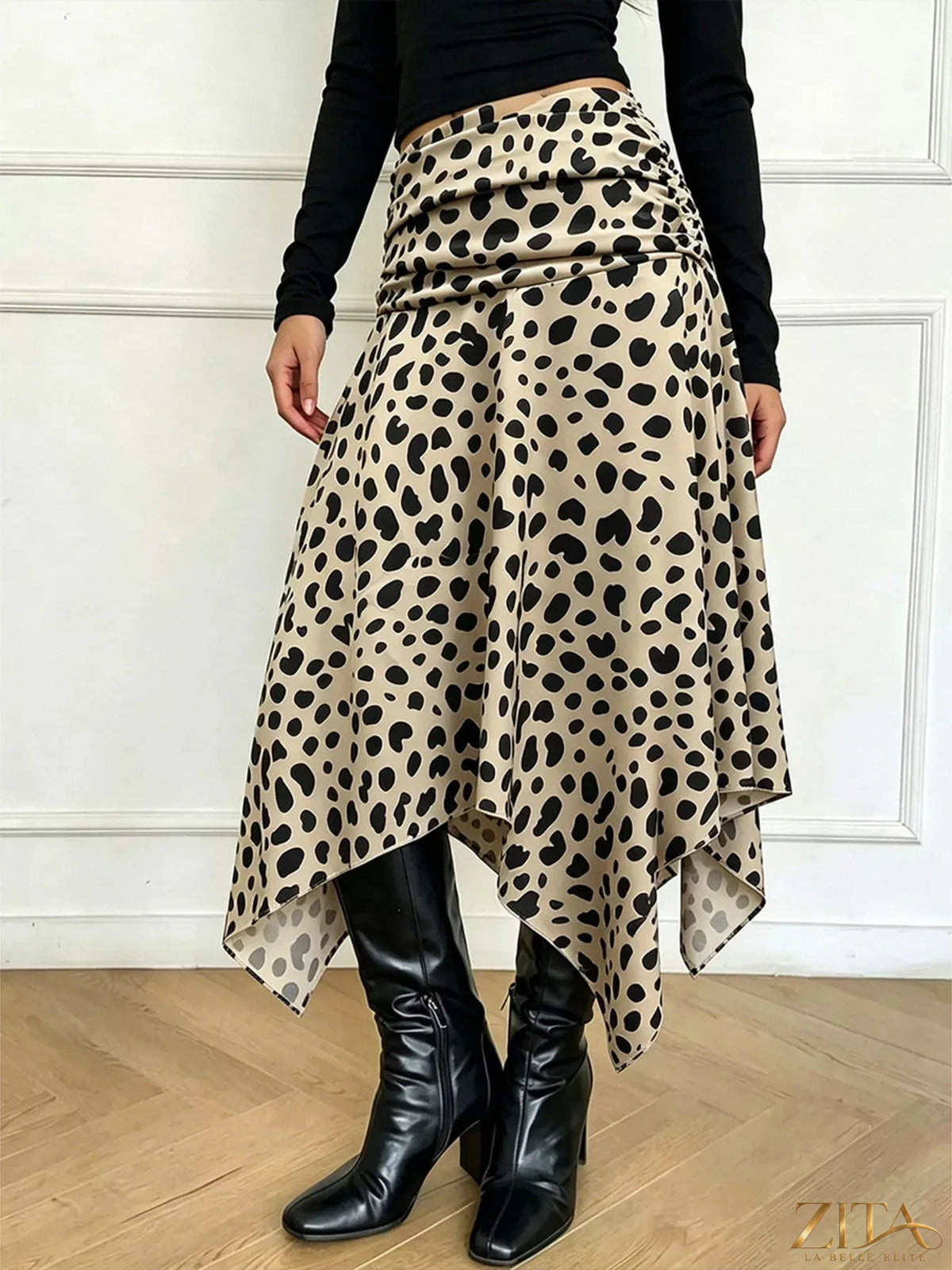 Leopard print asymmetrical hem midi skirt from Trendsi, featuring bold animal pattern and stylish irregular hem design.