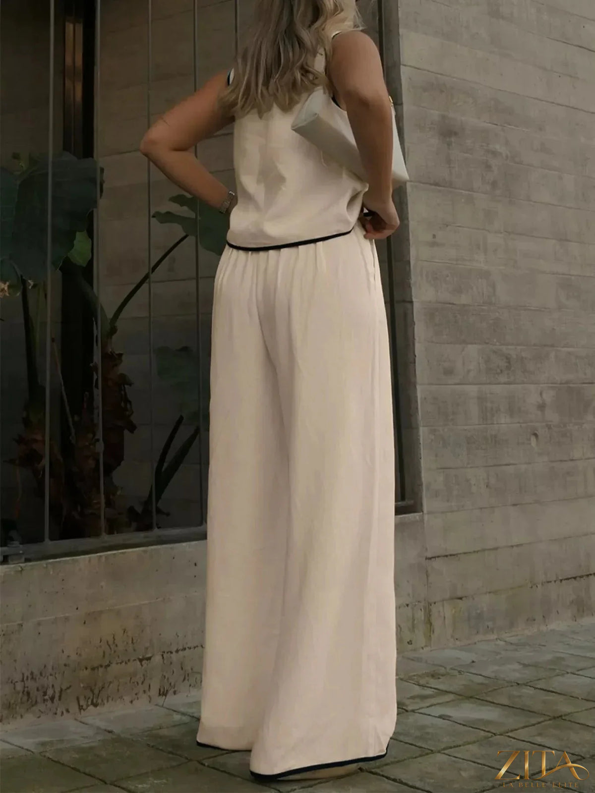 Zita La Belle Elite contrast trim top and wide-leg pants set, featuring stylish design and comfortable fit, shown on a model.
