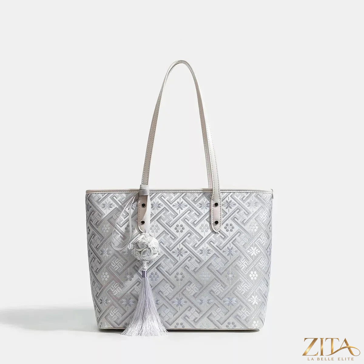 Zita La Belle Elite geometric pattern tote bag with colorful angular designs on durable fabric, ideal for everyday use.