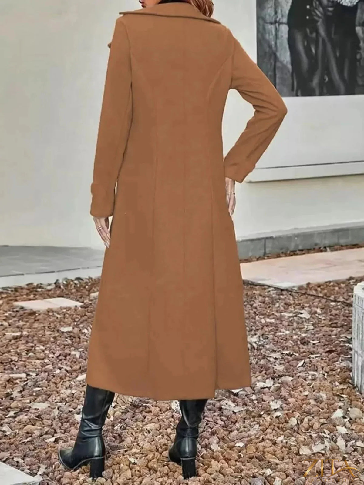 Plus size Zita La Belle Elite longline double-breasted trench coat with classic collar and belt, styled for a sophisticated look.