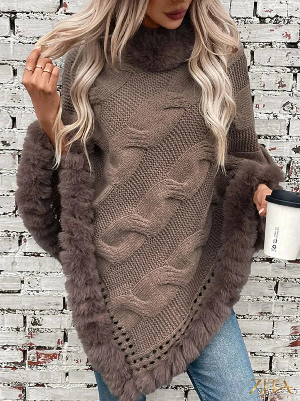 Fuzzy hem cable-knit poncho by Trendsi featuring a cozy, textured design and relaxed fit in neutral tones.