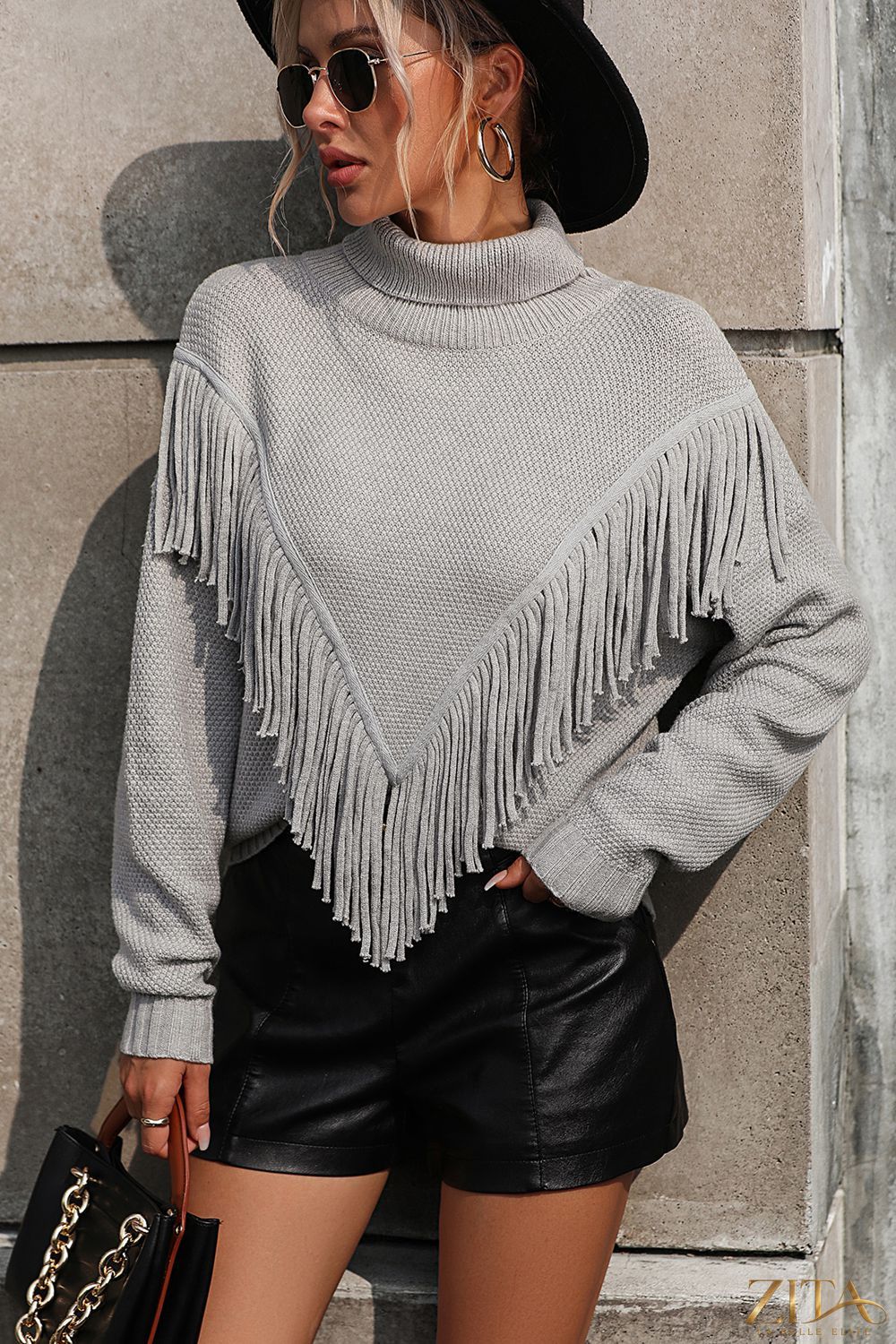 Gray turtle neck tassel front long sleeve pullover sweater by Trendsi, showcasing its cozy fit and stylish tassel detail at the front.