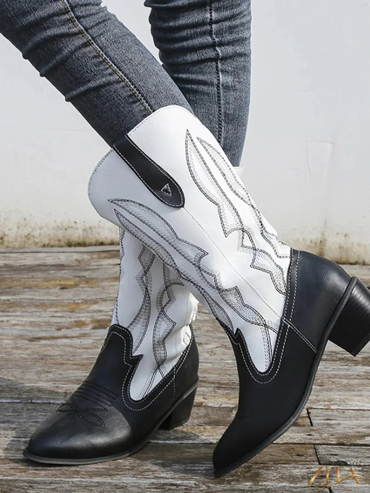 Western embroidered cowgirl boots by Trendsi featuring intricate embroidery and classic cowboy style in brown leather.