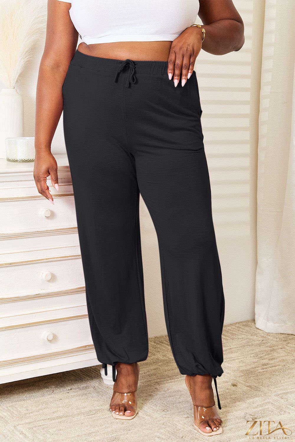 Zita La Belle Elite Basic Bae full-size soft rayon drawstring waist pants with pockets on a model.