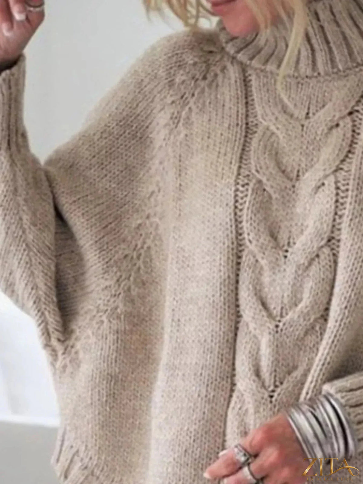 Zita La Belle Elite cable-knit long sleeve sweater in soft, cozy fabric, featuring a classic knitted pattern and a relaxed fit.