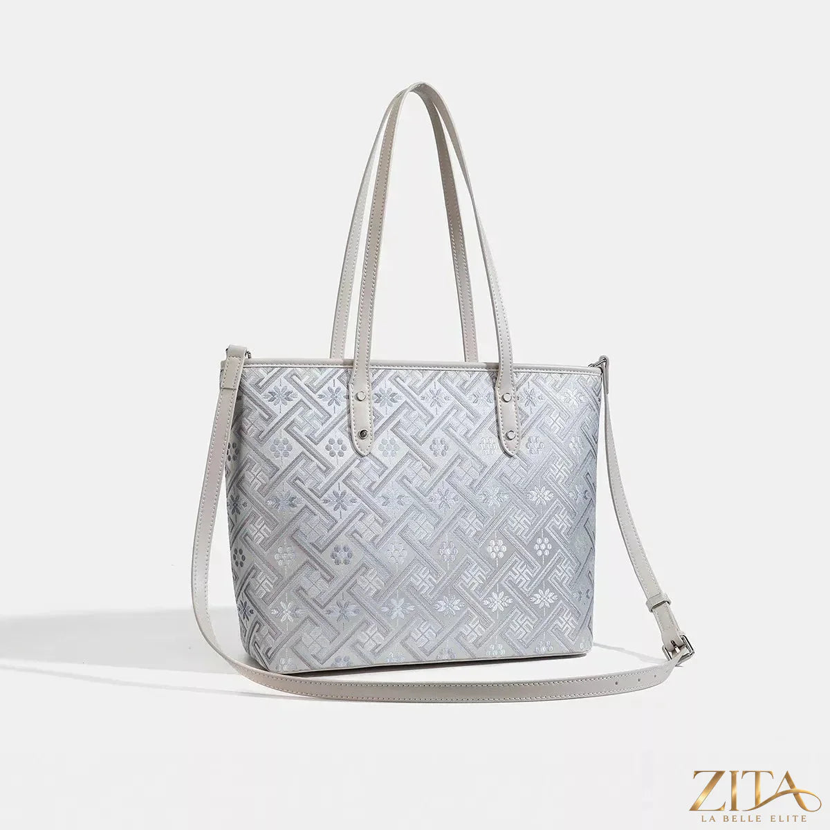 Zita La Belle Elite geometric pattern tote bag with bold black and white shapes, durable fabric, and top handles.