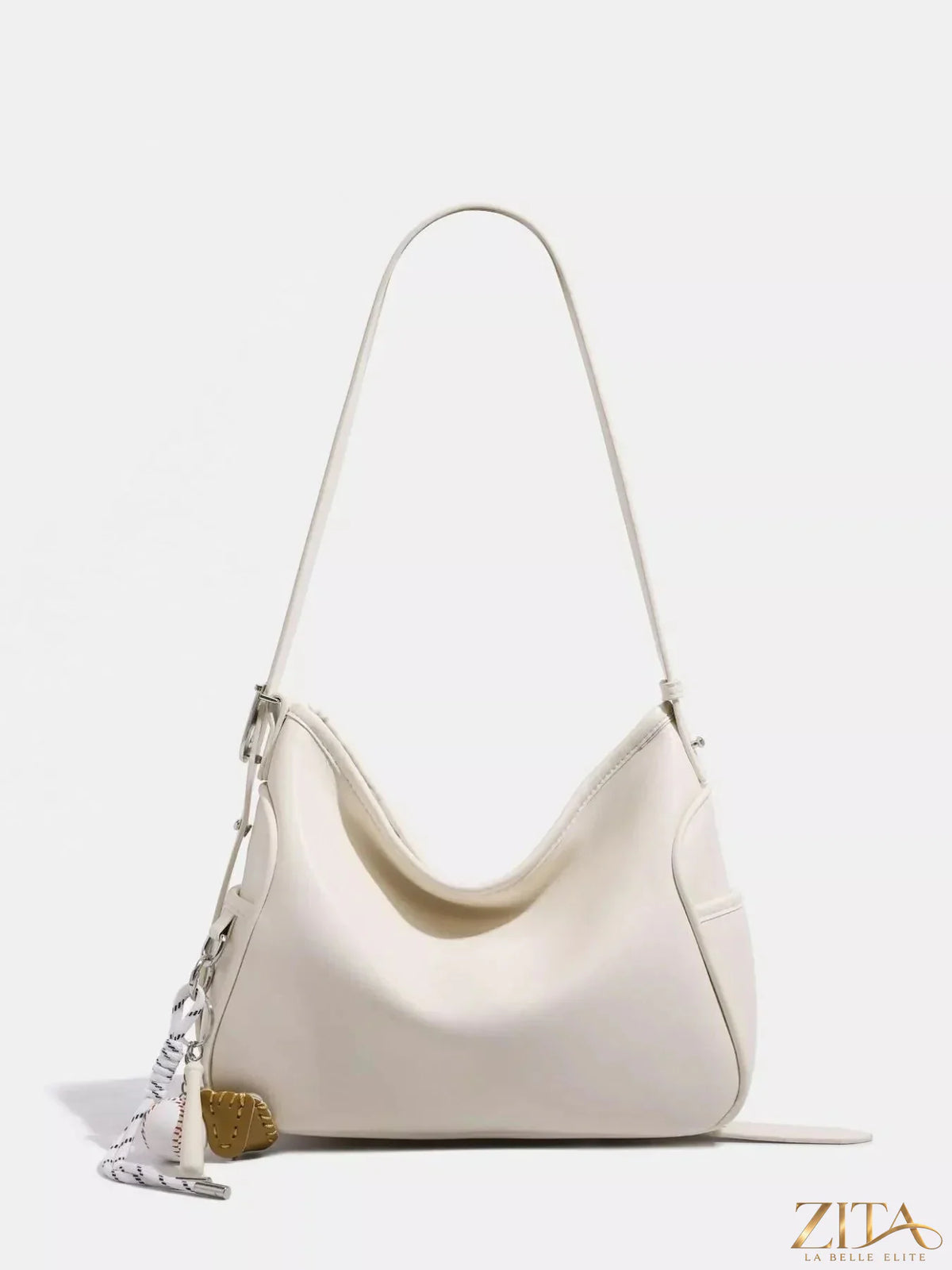 Leather slouchy shoulder bag by Zita La Belle Elite with soft, spacious design and adjustable strap, shown in natural leather finish.