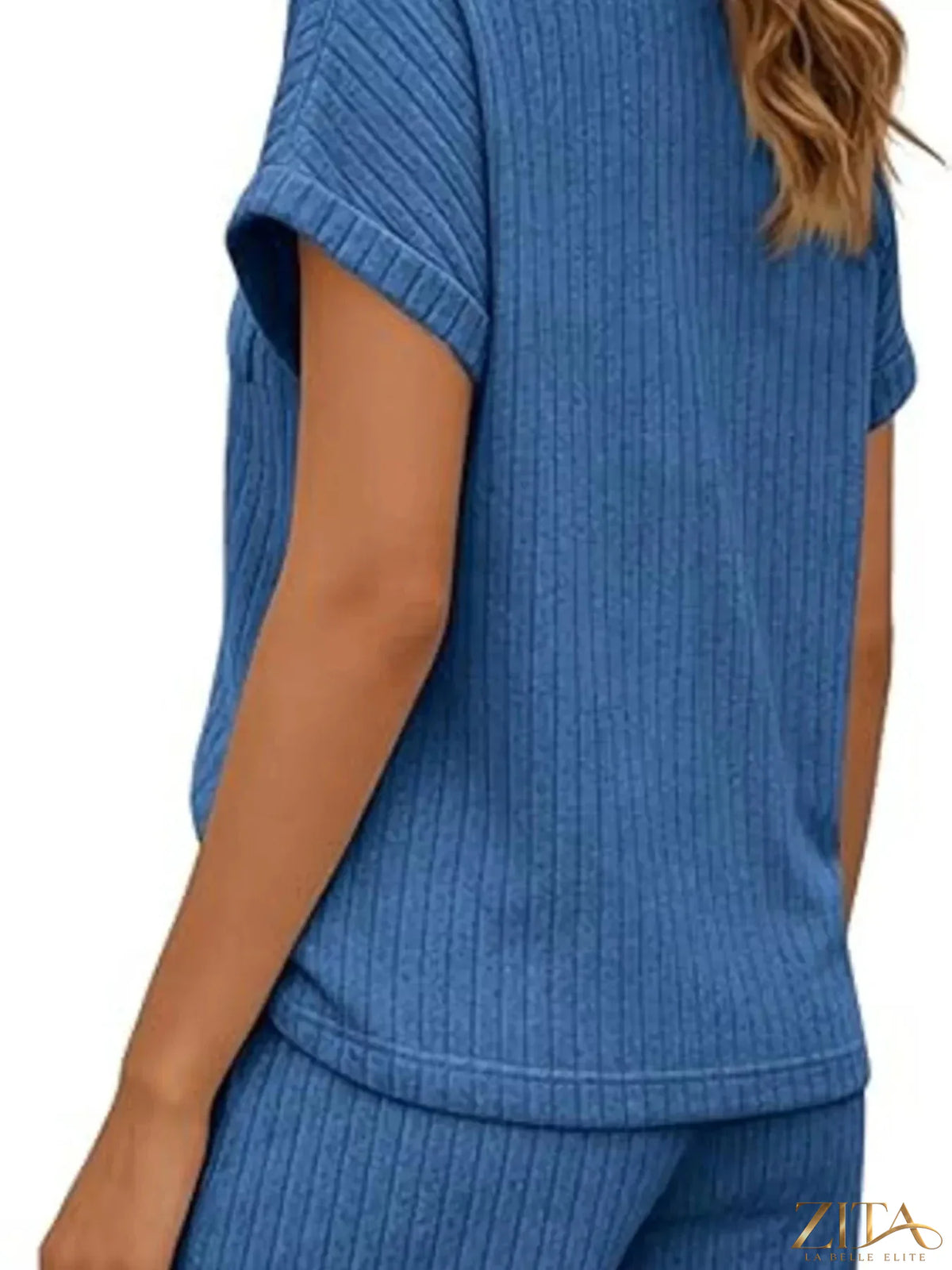 Casual ribbed knit tee and shorts set from Trendsi, featuring a comfortable, stylish matching top and bottom in a soft fabric.