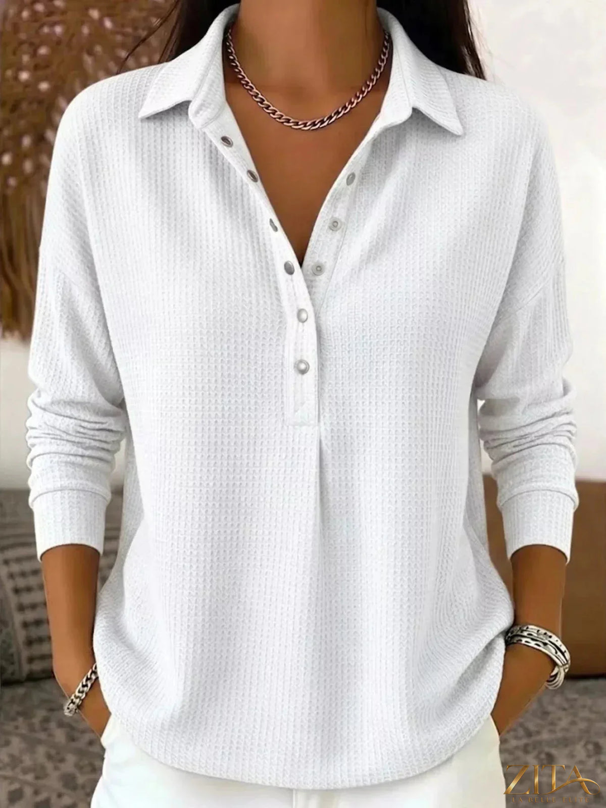 Zita La Belle Elite waffle knit snap-down blouse in soft fabric, featuring a collar and button closures, displayed on a hanger.