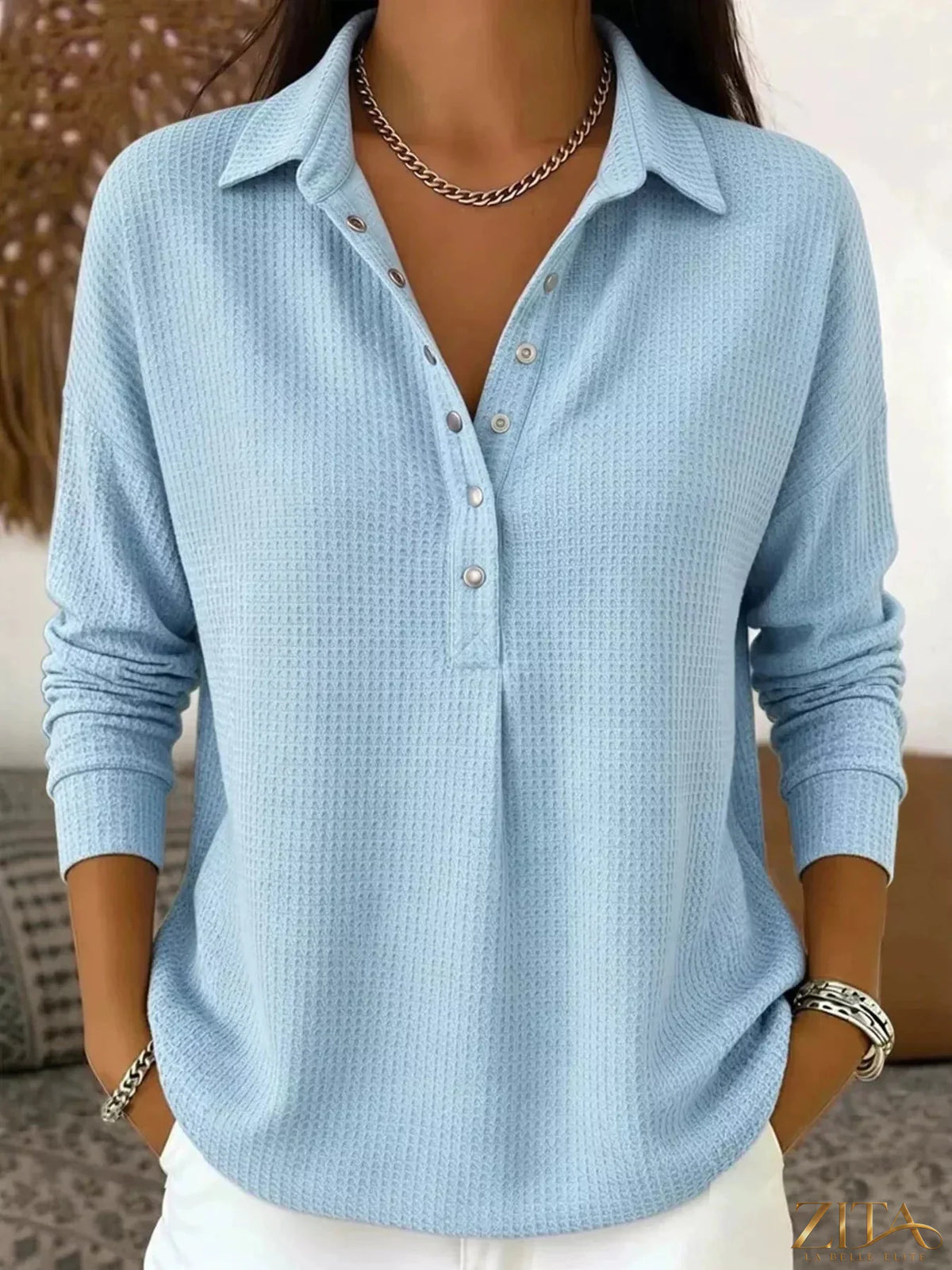 Zita La Belle Elite waffle knit snap-down blouse in beige, featuring a collared neckline and button details.
