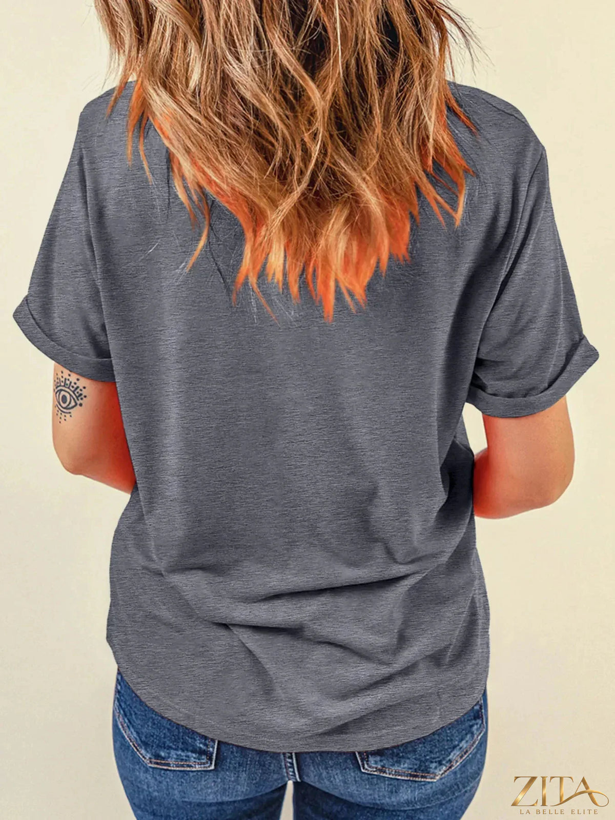 Sequin bow short sleeve T-shirt by Trendsi featuring shiny sequins, a bow detail, and a casual fit for stylish everyday wear.