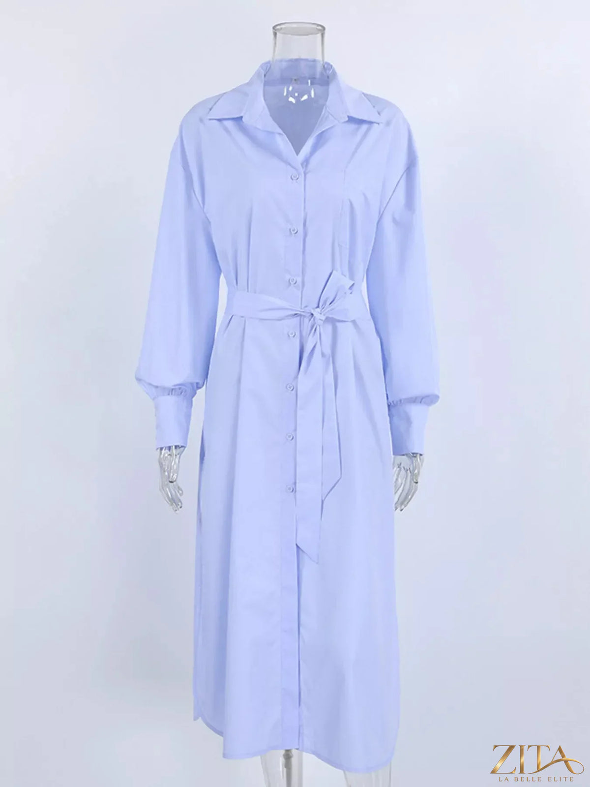 Longline button-down shirt by Zita La Belle Elite featuring a classic collar, button closure, and extended hem in a stylish design.